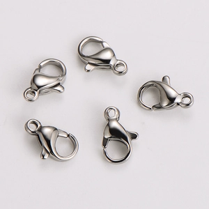 Polished silver stainless steel lobster clasps for jewelry making in a flat lay view
