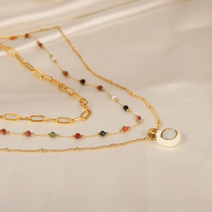 Three-layer bohemian gold plated titanium necklace with natural white shell and beads