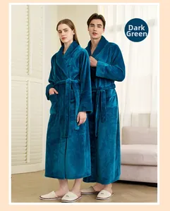 Detail view of dark green flannel bathrobe with thick plush texture and geometric patterns