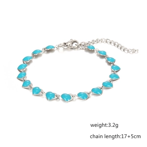 Silver stainless steel heart bracelet with blue resin charm and adjustable chain link