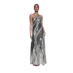 Silver sequin halter dress with fringe detail and asymmetrical ruffle for formal evening party