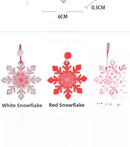 Detail of 6cm red and white wooden Christmas ornaments with snowflake patterns and ropes