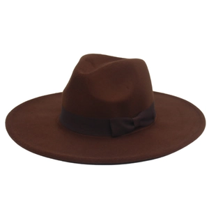 Close-up of deep brown wool felt fedora with elegant ribbon bow and wide brim details
