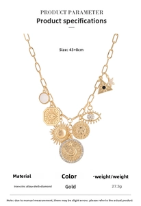 Detail view of gold coin pendant necklace with sun, moon, and star charms parameters
