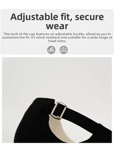 Detailed close-up of adjustable matte silver metal buckle on a black cotton baseball cap