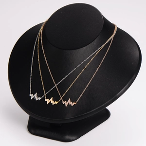 Three-piece stainless steel heartbeat necklaces with heart pendants and crystal inlay