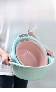Detail view of thickened plastic washbasins featuring heightened splash-proof design
