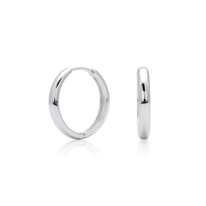 Macro detail of polished s925 silver hoop earrings with smooth mirror finish and clasp