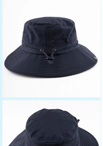 Detail of navy sun hat showing breathable mesh side panels and adjustable wind cord
