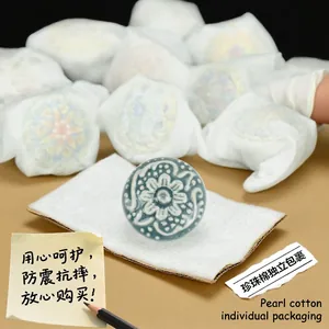 Vintage floral ceramic drawer knob in greyish-blue finish with embossed flower design