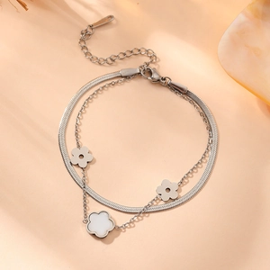 Double-layer stainless steel bracelet with white shell flower charms and snake chain