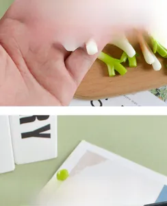 Detailed view of realistic miniature scallion pendant showing green and white gradient