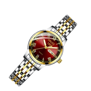 Minimalist quartz watch with slim two-tone steel strap and red gradient Roman dial