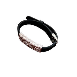 Dark style pleated black leather bracelet with ornate silver embossed metal buckle