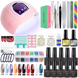 Complete nail gel kit with pink UV LED lamp, tools, stickers, and 10 color polishes