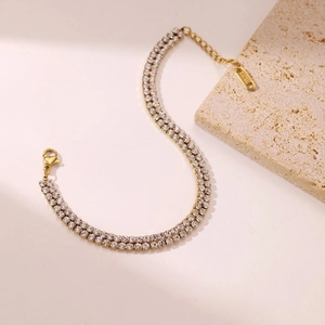 Elegant double-row zircon bracelet in gold stainless steel with lobster clasp and extension chain