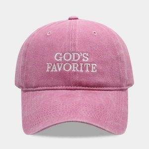 Pink washed cotton baseball cap with white God's Favorite embroidery and curved brim