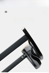 Macro shot of durable metal hinges and 58-18-145 size marks on black cat-eye sunglasses