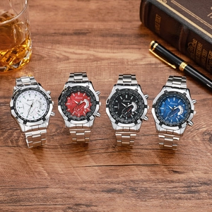 Macro view of luxury quartz watches with stainless steel bands on a vintage wooden desk