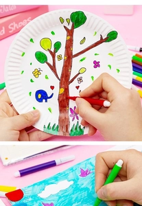 Close-up of colorful watercolor pens used for DIY painting on paper plates and cards