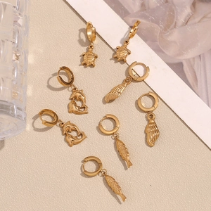 Detailed close-up of 18K gold plated stainless steel marine series hoop earrings with sea life charms