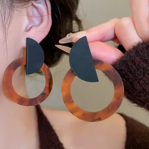 Retro resin round hoop earrings with dark tortoise texture and matte black studs