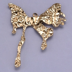 Macro detail of gold butterfly pendant with fluid molten metal texture and top ring