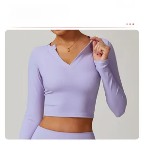 Close-up of V-neck design on light purple long sleeve yoga crop top for women
