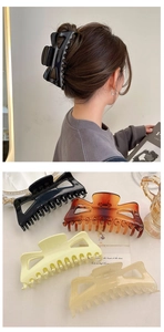 Detail of 14cm oversized hair claw clips in four colors with a model wearing the black style