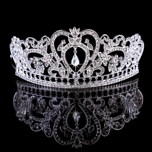 Elegant European baroque silver crown with crystal heart pattern and pear-shaped drop