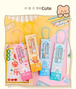 Close-up of a 5-in-1 stationery set with pencils, ruler, and eraser in pastel colors