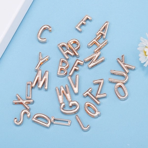 Rose gold 10mm A-Z alloy charms for DIY bracelets with floral decorative background