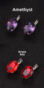 Close-up of oval zircon leverback earrings in fuchsia and deep red crystal