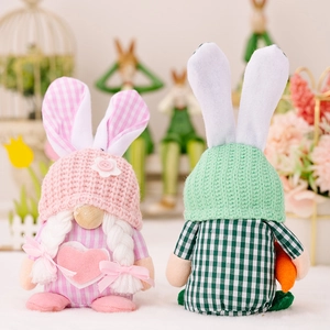 Easter bunny gnome decorations with pink and green plaid knit hats and plush details
