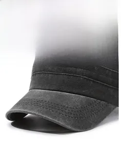 Detailed close-up of the stiff brim on a vintage dark grey washed canvas flat top military cap