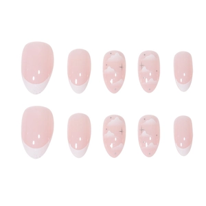 Short almond press-on nails with white cloud designs and French tips in pink tones