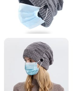 Detail of grey knitted hat with side buttons to hold mask straps and reduce ear pressure