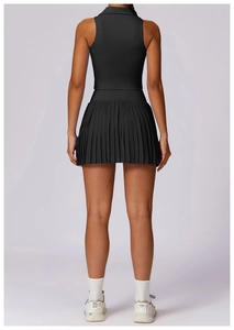Back view of a black sleeveless pleated tennis dress featuring a stylish polo collar