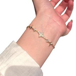 18k gold plated star bracelet for women featuring sparkling cubic zirconia on white background