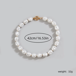 Detail view of Baroque pearl necklace showing length 42cm and weight 32g dimensions