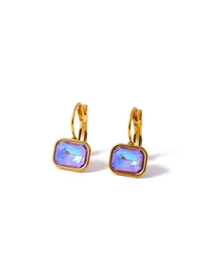 Macro detail of gold hoop earrings with square gradient purple and blue zircon crystals