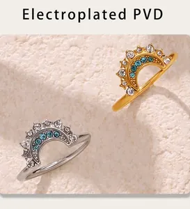 Macro shot of sun and moon zircon rings in gold and silver finish with PVD plating