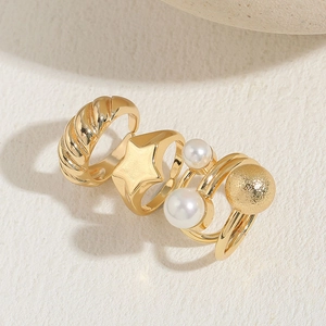 Set of four 14K gold plated geometric rings with pearls and star details for women
