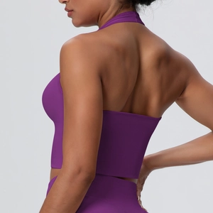 Detail view of purple halter yoga bra and high waist leggings with backless design
