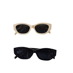 Chic cat eye sunglasses in cream white and classic black with UV protection