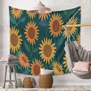 Detail of bohemian sunflower tapestry on a white wall with cozy room decor