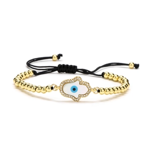 Adjustable Hamsa Hand and Evil Eye gold beaded bracelet with black woven cord