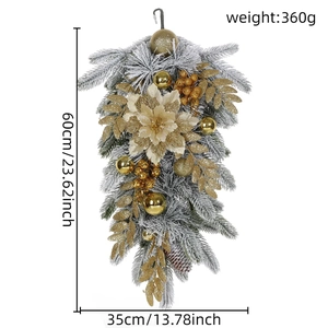 Detailed view of 60cm flocked Christmas swag with gold flowers, berries and pine cones