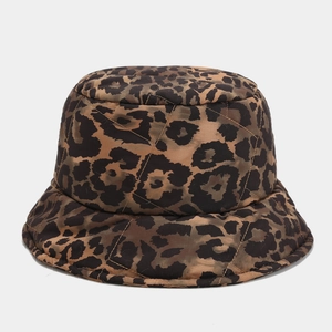 Close-up of leopard print bucket hat featuring quilted stitching and warm fabric texture