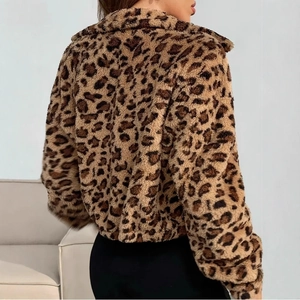 Detailed back view of a plush leopard print faux fur jacket with soft fleece texture